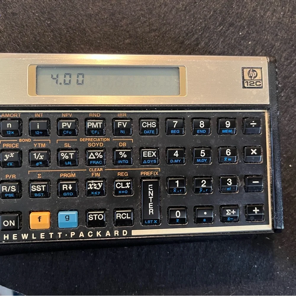 Vintage HP 12C Calculator - Black and Gold